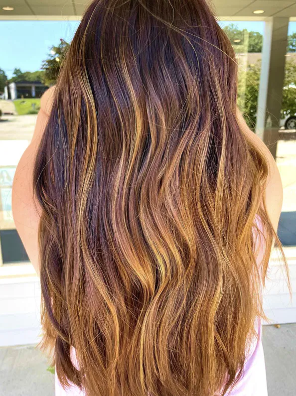 Long wavy brunette hair styling
